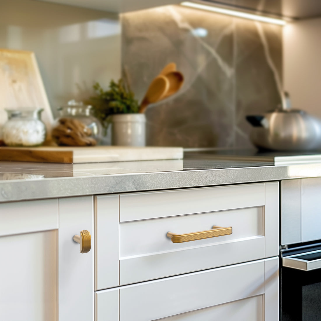 Light brass cabinet pull installed on cabinets or drawers