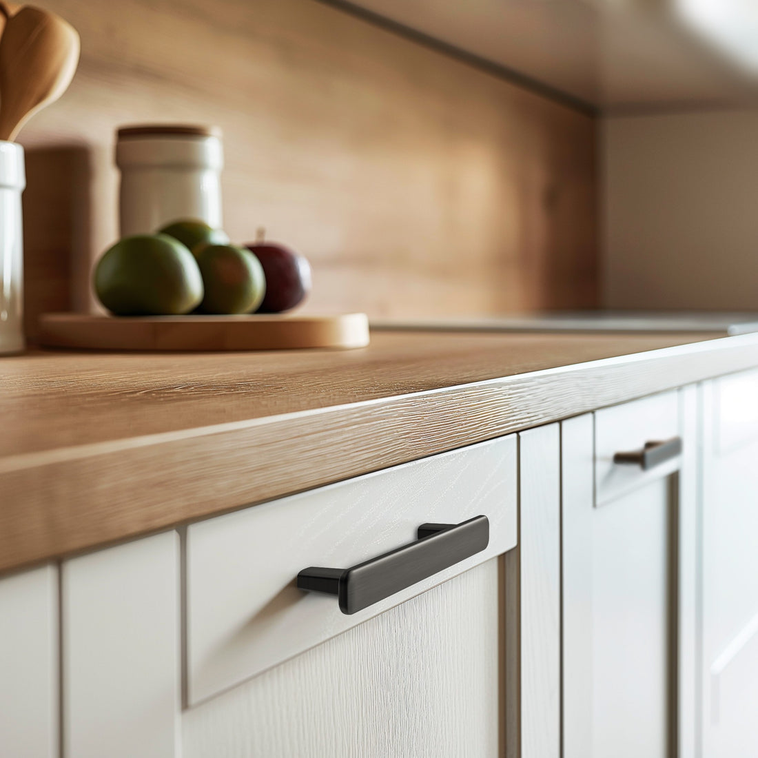 Black nickel cabinet pull installed on cabinets or drawers
