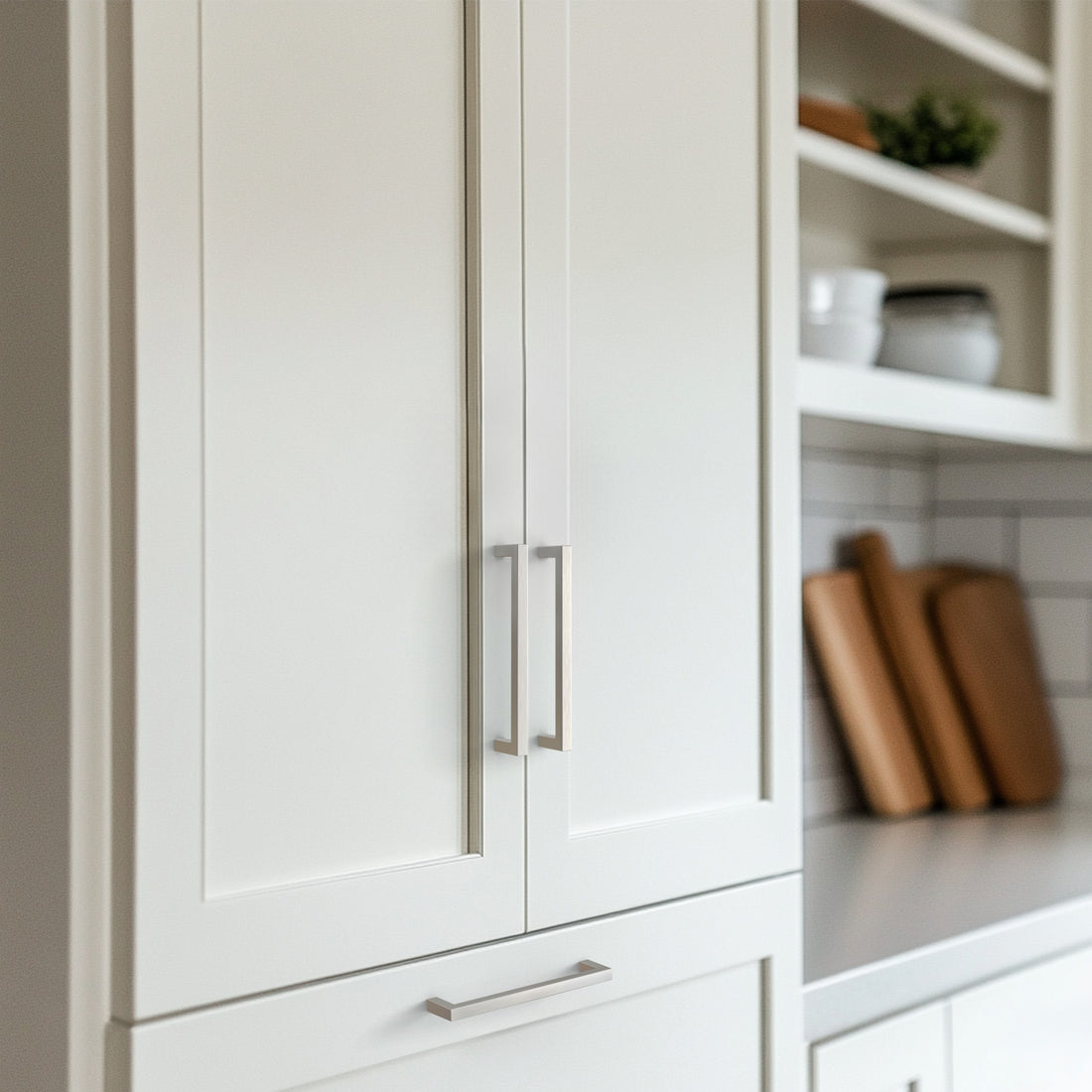 Satin nickel cabinet pull installed on cabinets or drawers