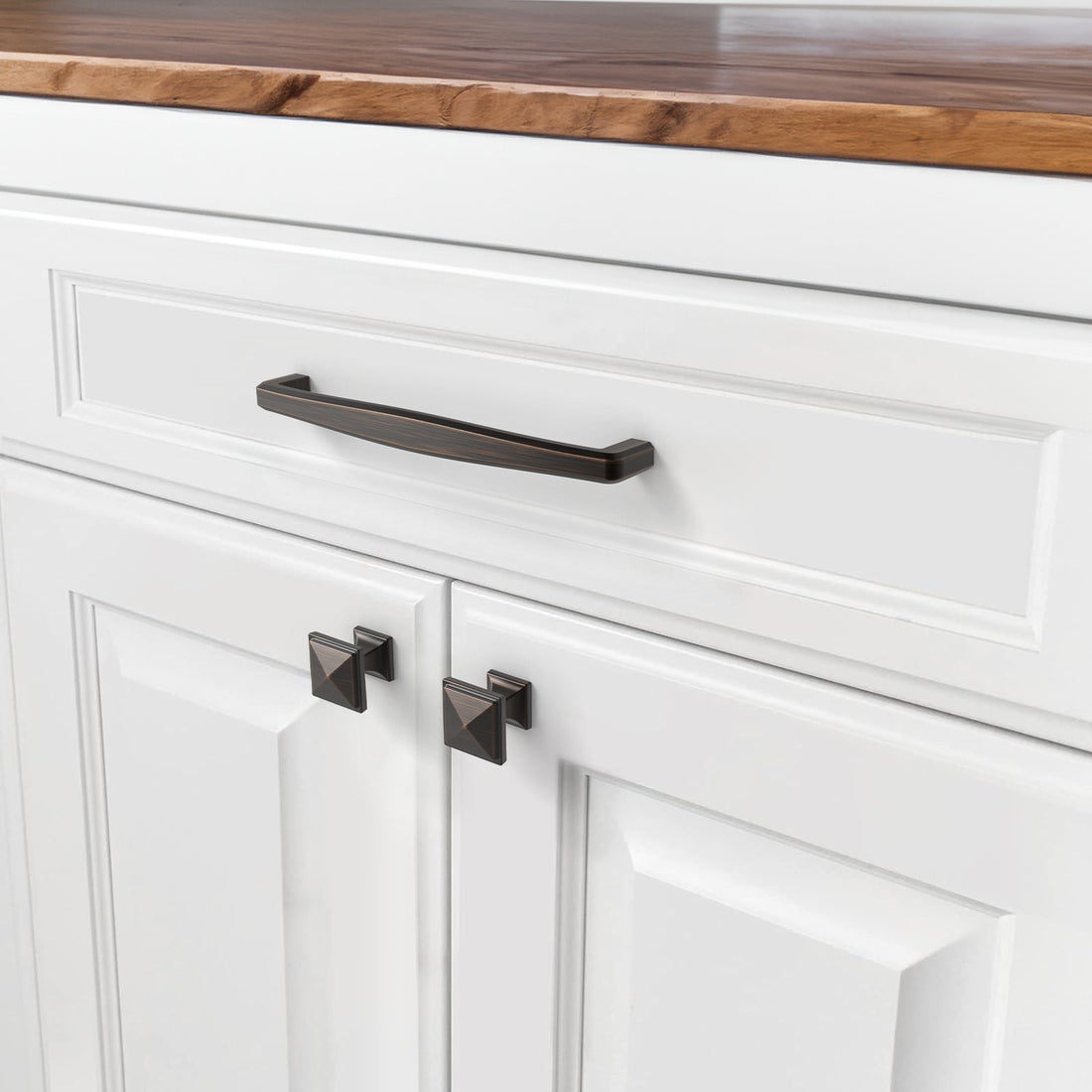 Oil rubbed bronze cabinet pull installed on cabinets or drawers