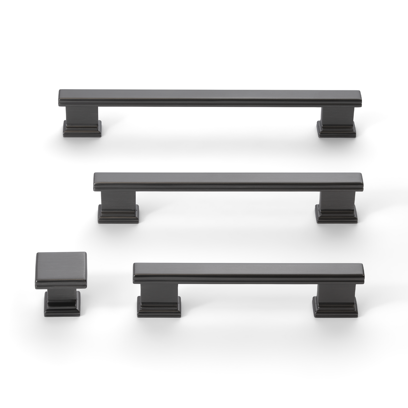 Set of black nickel cabinet pull in multiple sizes on white background