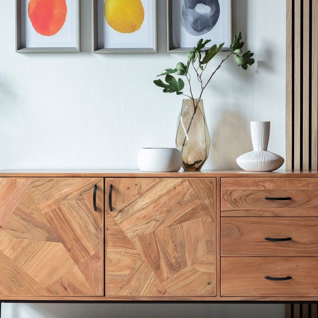 Black cabinet pull installed on cabinets or drawers